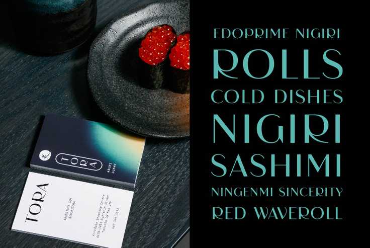 Type specimen of the Aburi Tora typeface on the right, paired with a photo of a business card on the left.